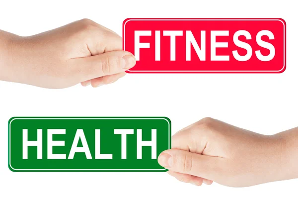 Fitness and Health traffic sign in the hand — Stock Photo, Image