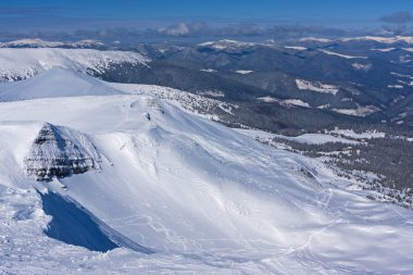 А view from the snow-capped peak. clipart