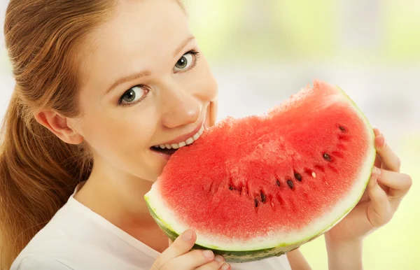 Happy girl eats the watermelon — Stock Photo, Image
