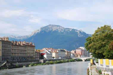 View of Grenoble with the wide river Isere. clipart