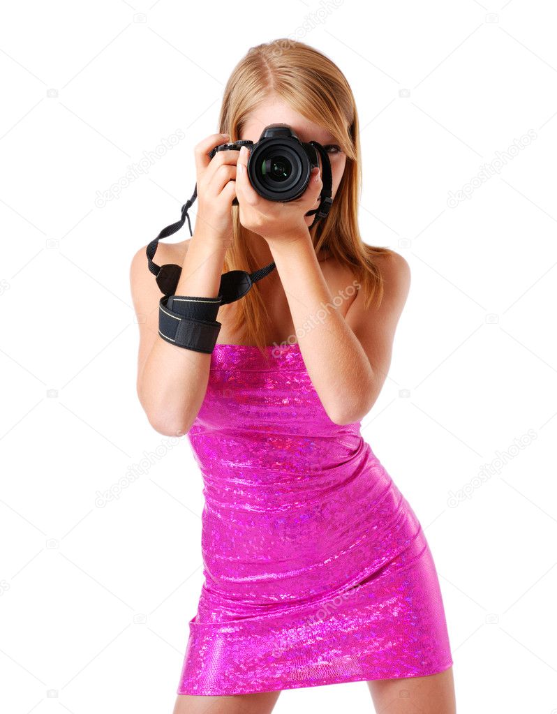 Pretty woman photographing with a big camera