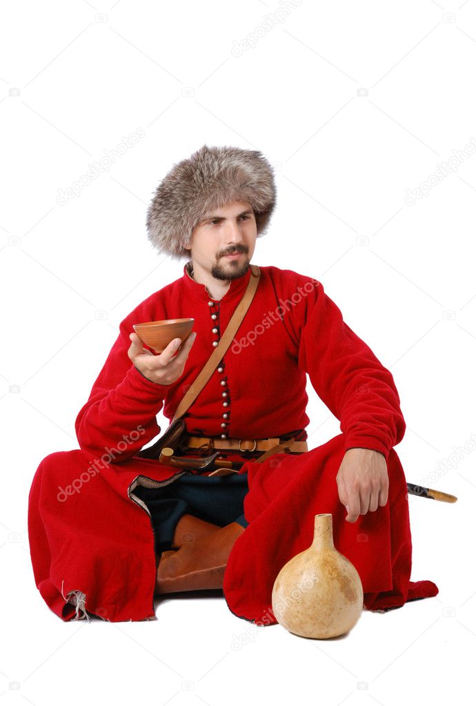 Tatar warrior sitting with cup and calabash.