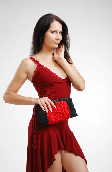 Mulher bonita com uma bolsa . — Fotografia de Stock