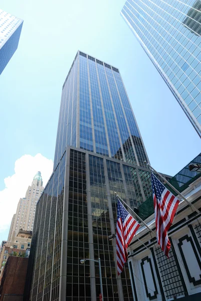 Stock image Skyscrapers and american flags of New York