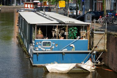 Houseboat in the Dutch town. clipart