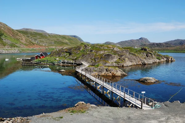 Small island with fishing village in the middle of fjord, Mageroya. — Stock Photo, Image
