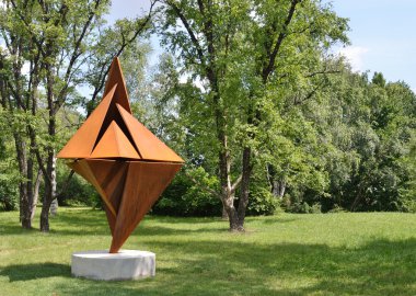 Modern sculpture in the National Botanical Garden of Kyiv. clipart
