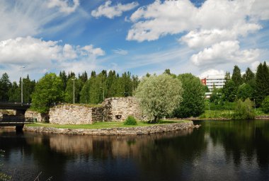 Summer view with ruins of castle on island, Kajaani, clipart