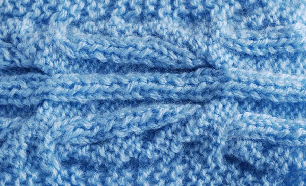 Primo piano di stoffa lavorata a maglia con trattoria vegetale — Foto Stock