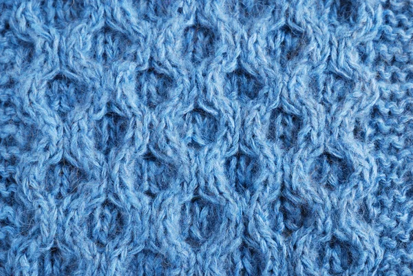 Close-up de tecido de malha com tracery levantado — Fotografia de Stock