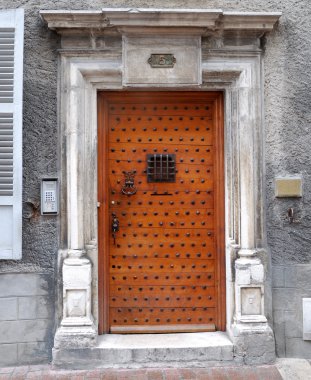 Vintage wooden entrance with lattice window clipart