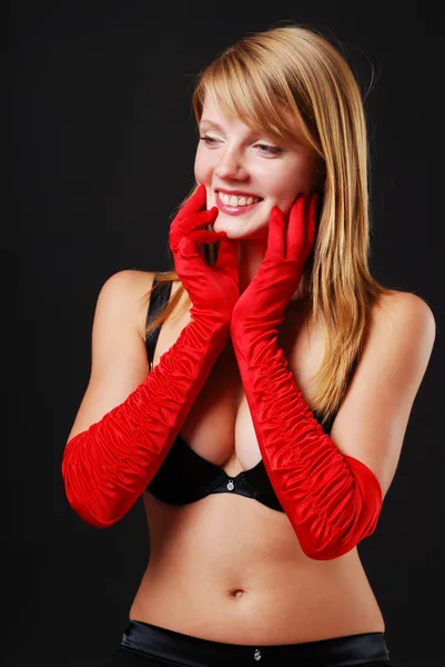 Encantadora rubia con guantes rojos — Foto de Stock