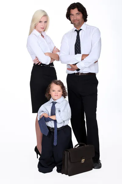 Rodina v obchodním oděvy — Stock fotografie