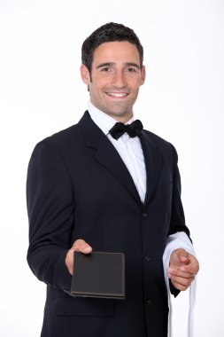 Waiter with a menu clipart