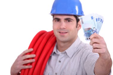 Plumber holding cash clipart