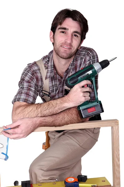 Man with hand drill — Stock Photo, Image