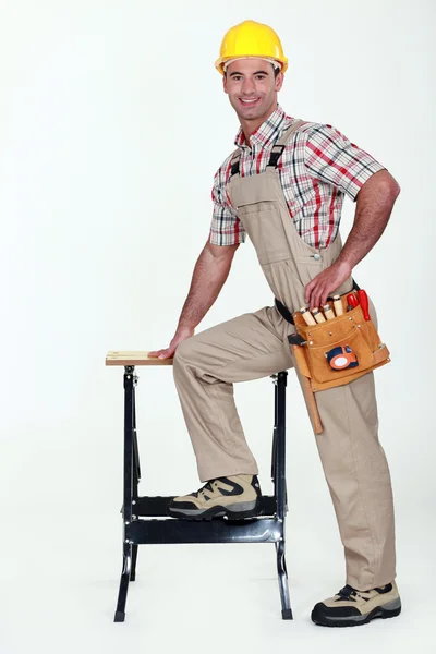 Carpenter stood by work-bench — Stock Photo, Image