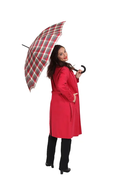 Женщина с тартановым зонтиком — стоковое фото