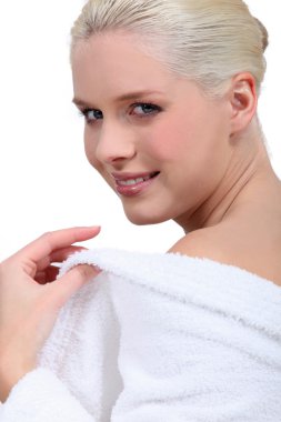 Blond woman in dressing gown clipart