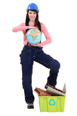 Female laborer holding globe clipart