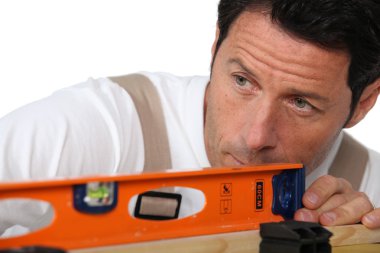 Man with spirit level clipart