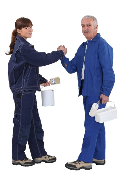 Craftsman and craftswoman shaking hands — Stock Photo, Image