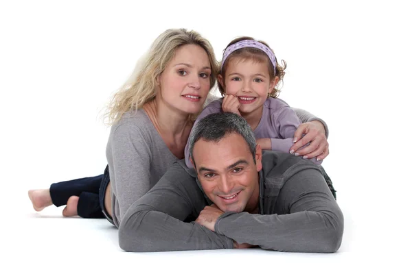 Studio záběr rodičů s jejich dcerou — Stock fotografie