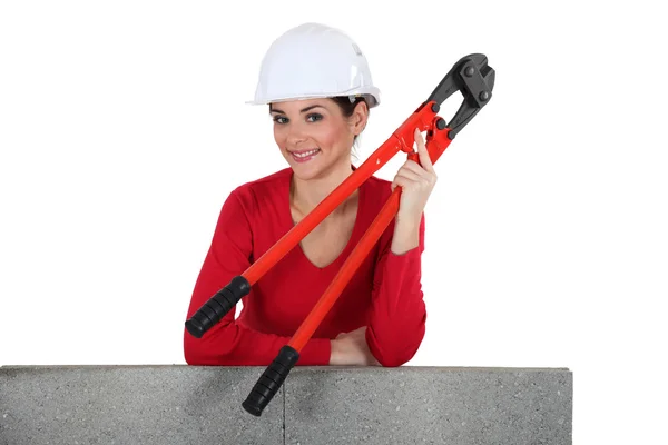 Woman with boltcutters — Stock Photo, Image