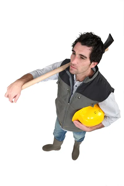 Trabajadores con casco en la mano — Foto de Stock