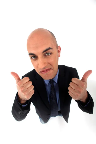 Bald office worker giving thumbs-up — Stock Photo, Image