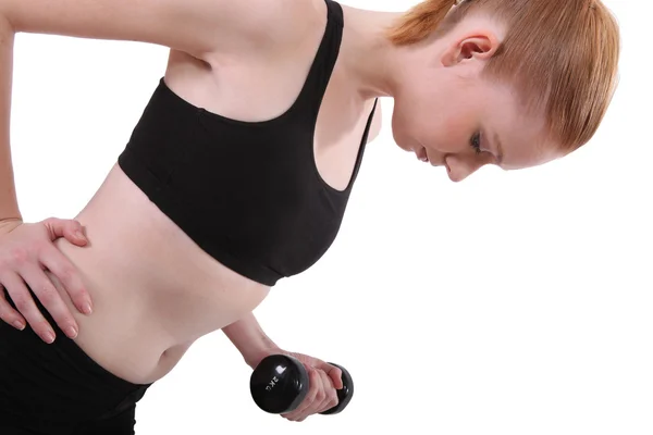 Mujer joven entrenando con pesas —  Fotos de Stock