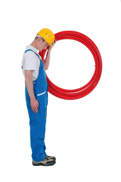 Electrician forming a P — Stock Photo, Image