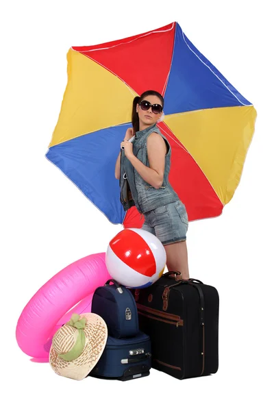 Woman leaving for a warmer climate — Stock Photo, Image