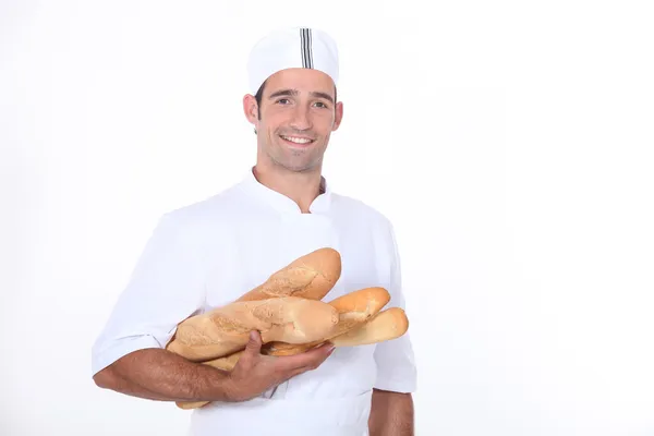 Bäcker mit Baguette — Stockfoto