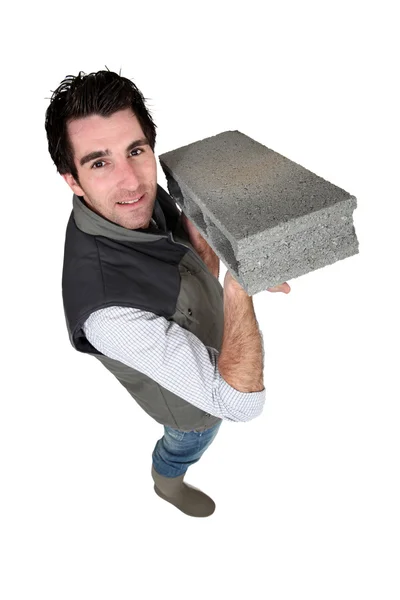 Cement block craftsman in the hands — Stock Photo, Image