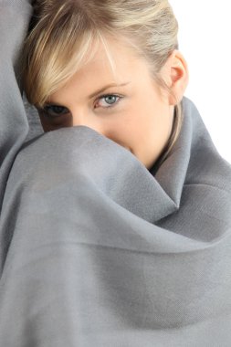Woman wrapped up in a blanket clipart