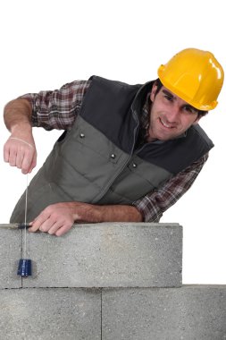 According to the plumb-bob it's ok clipart