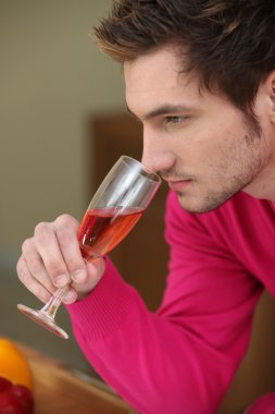Man smelling wine clipart