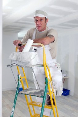 Painter climbing ladder clipart