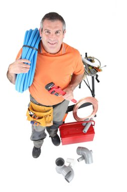 Plumber with tools of the trade clipart