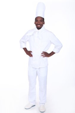 Proud chef stood with hands on hips clipart