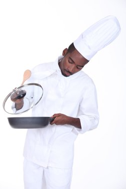 A chef in the kitchen clipart