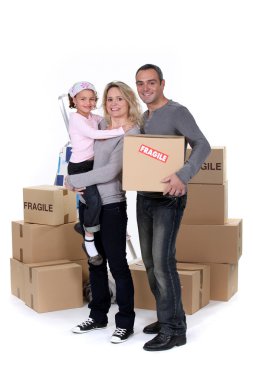 Portrait of a family on moving day clipart