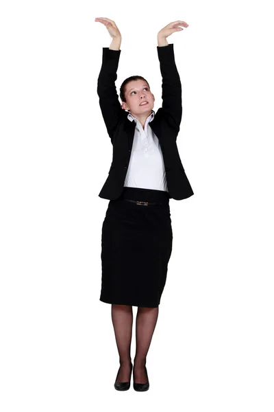 Businesswoman reaching up — Stock Photo, Image