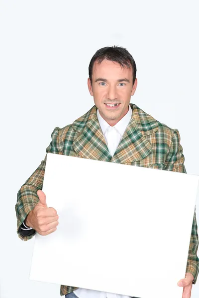 Man holding a white board — Stock Photo, Image