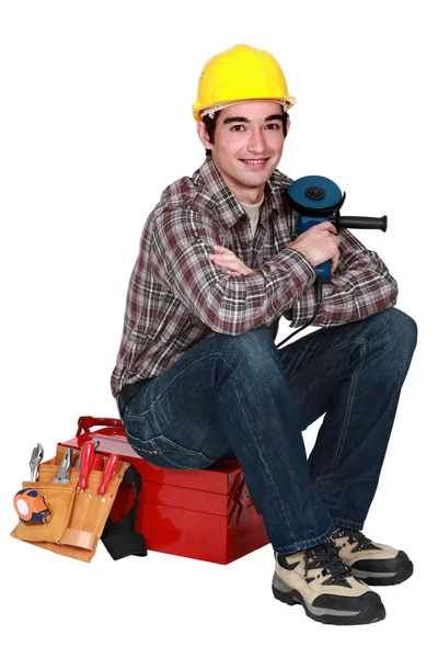 Mason sentado en la caja de herramientas — Foto de Stock