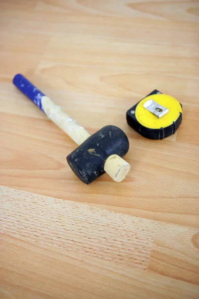 stock image Mallet and retractable measure