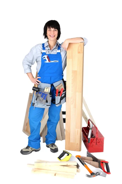 Carpinteiro feminino com ferramentas — Fotografia de Stock