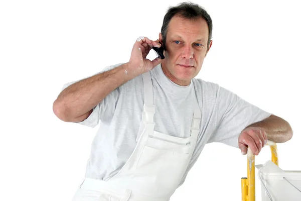 Painter making telephone call — Stock Photo, Image