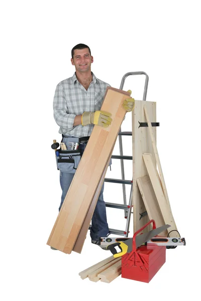 Carpenter with materials and tools — Stock Photo, Image